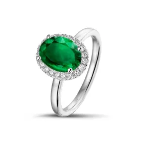 Halo anillo en oro blanco con esmeralda ovalada 