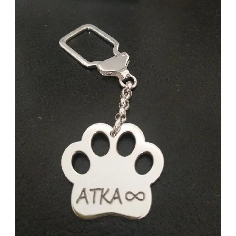 Llavero Huella de perro personalizada en plata de ley